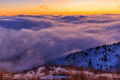 Predawn Glow Above the Clouds