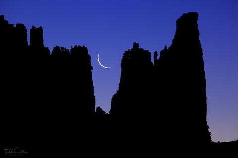 crescent moon and fisher towers near moab utah