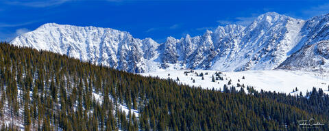 a photo of rime ice coating the pinnacles on the headwall of mayflower gulch in the tenmile range of colorado