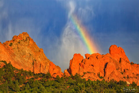 a photo of a rainbow over garden of the gods in colorado springs
