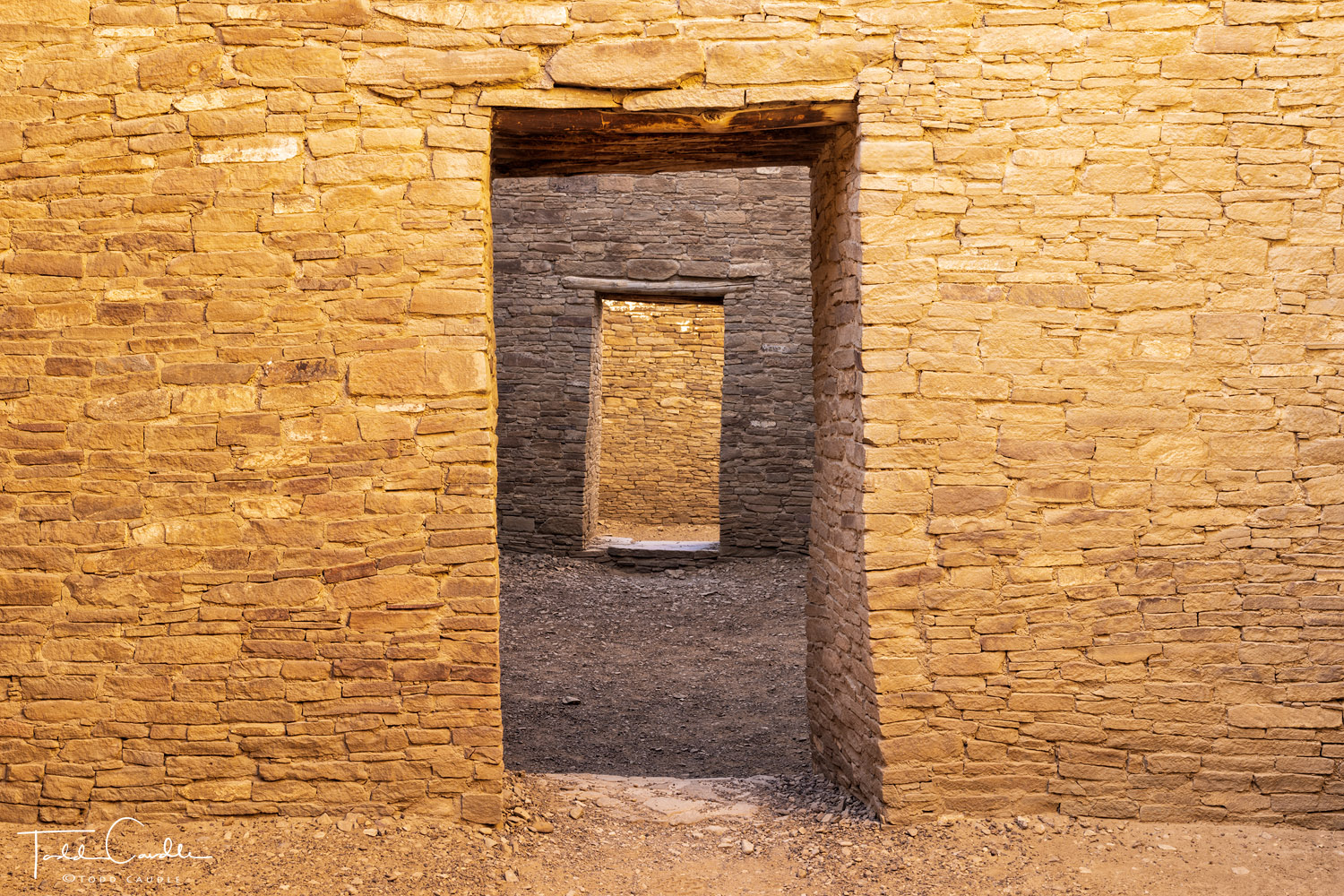 Doorways in Pueblo Bonito, a vast and isolated pre-Puebloan dwelling among the Chaco Canyon complex in northern New Mexico, reflects...
