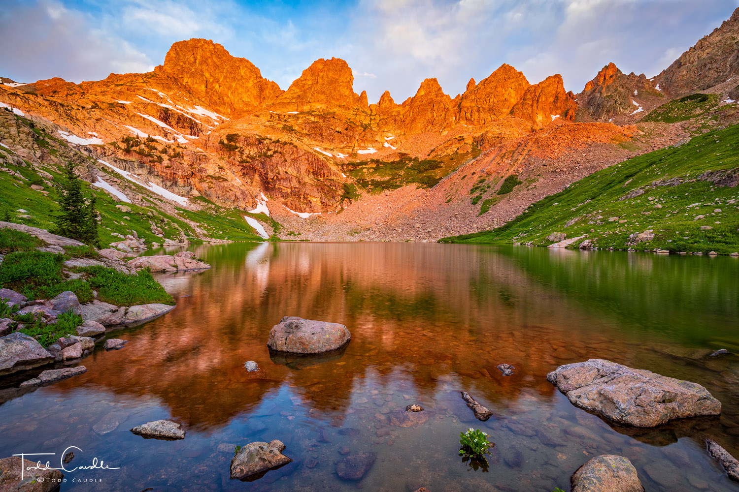 Spectacular Zodiac Ridge reflects in a lake deep in the Eagles Nest Wilderness at sunrise.