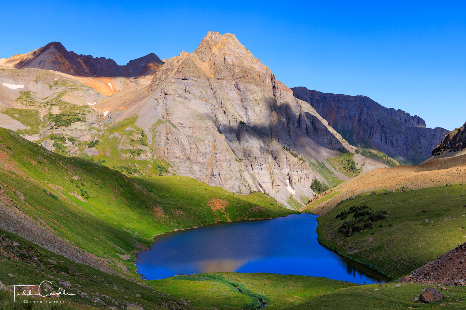 A perch above the middle of three Blue Lakes is the perfect place to enjoy a summer morning in the Colorado high country.